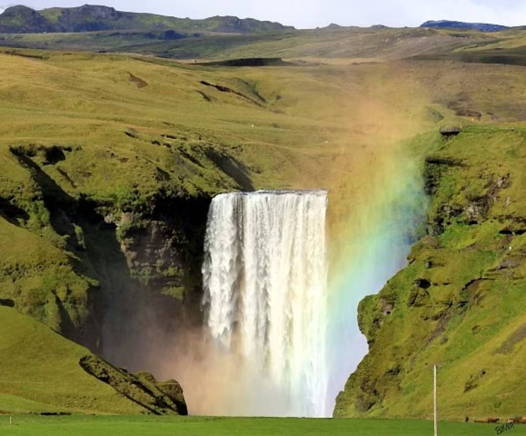 Skogafoss Waterfall with a rainbow