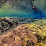 Iceland Snorkeler in Silfra Fissure within the Tectonic Plates